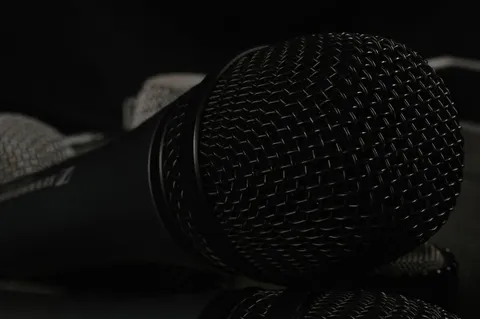 Close-up of a microphone windscreen with soft foam texture