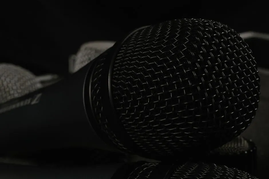 Close-up of a microphone windscreen with soft foam texture