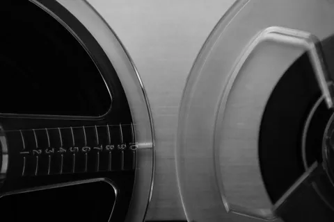 Close-up macro photograph of analog tape wound on a reel