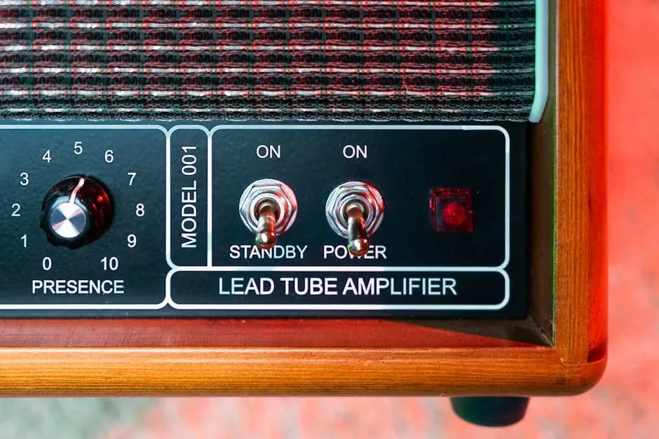close-up of a glowing power tube inside a guitar amplifier chassis